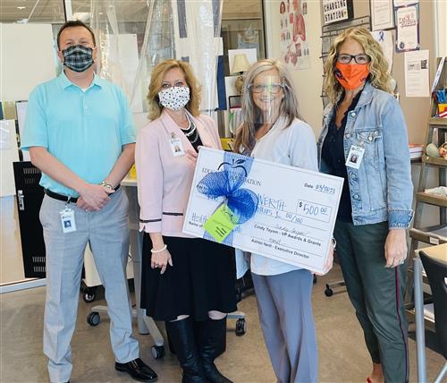 Rockwall ISD Education Foundation Donates Money for New EKG Machine at Burton Academy 